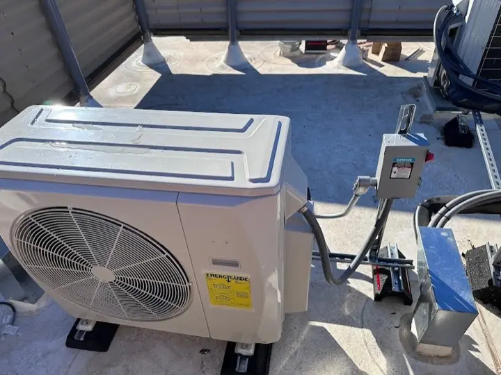 Air-conditioning disconnect installed on an exterior wall