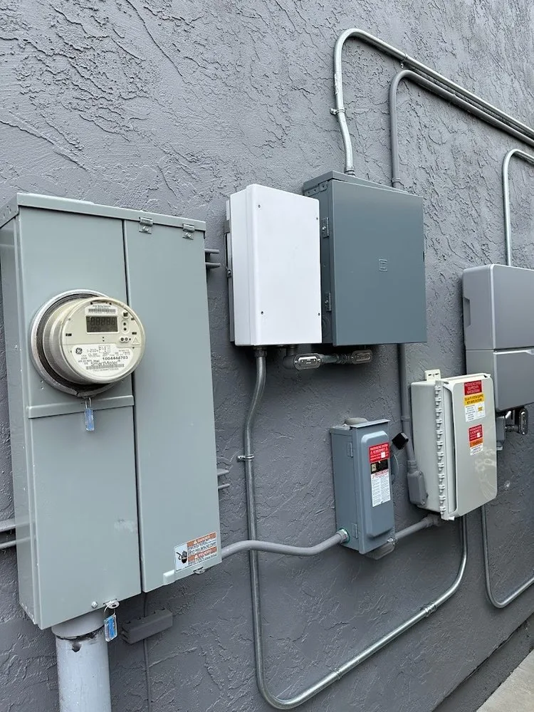 Residential main panel with breakers and conductors, installed by Litel Electric